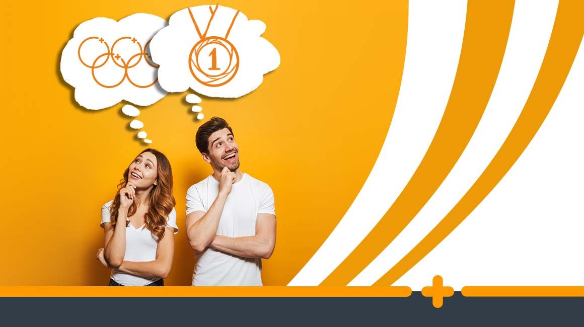 Uśmiechnięta para marząca o sukcesie – kobieta o igrzyskach, mężczyzna o złotym medalu